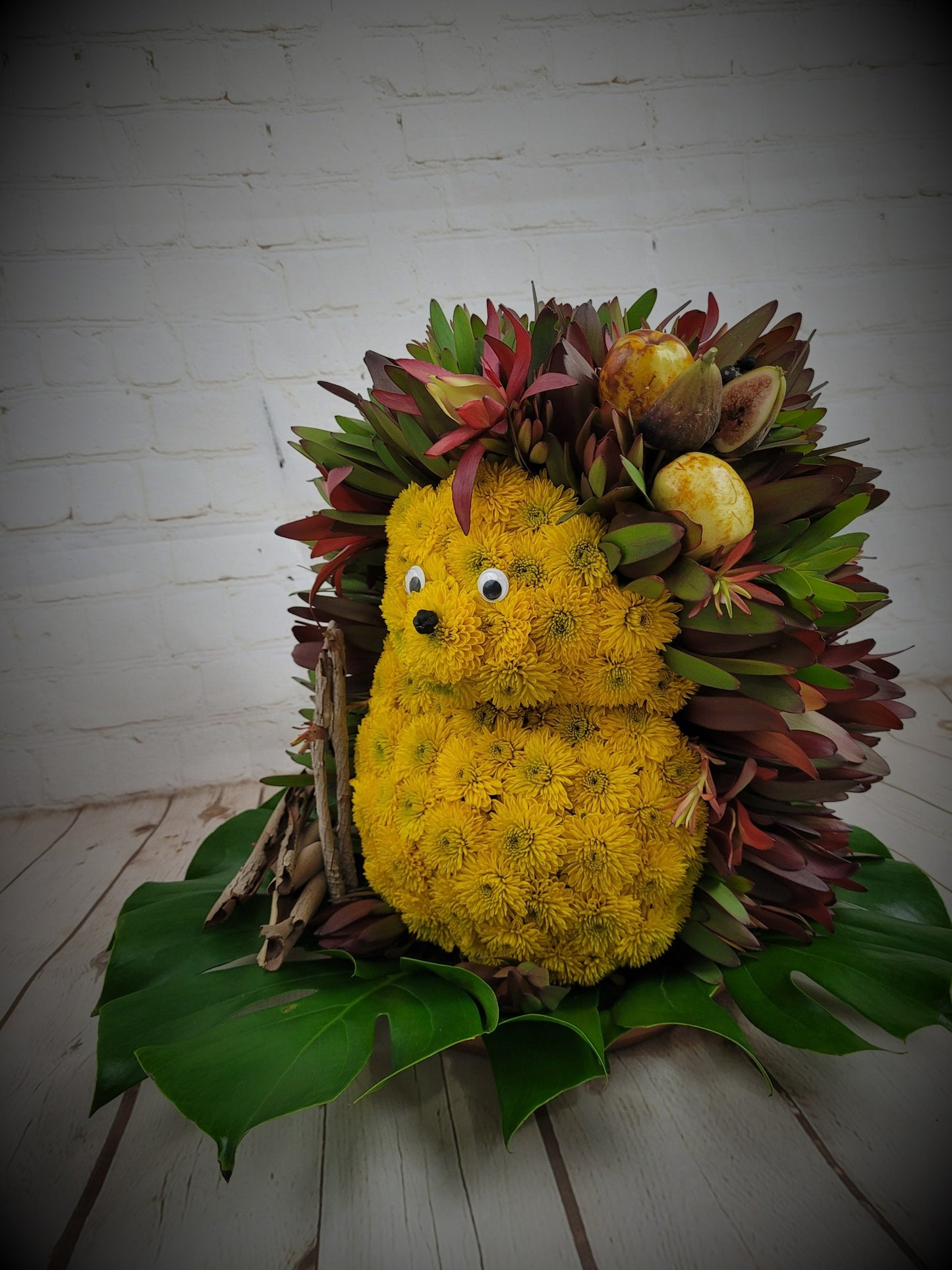 Chrysanthemums and Safari in Unique Shape Arrangement