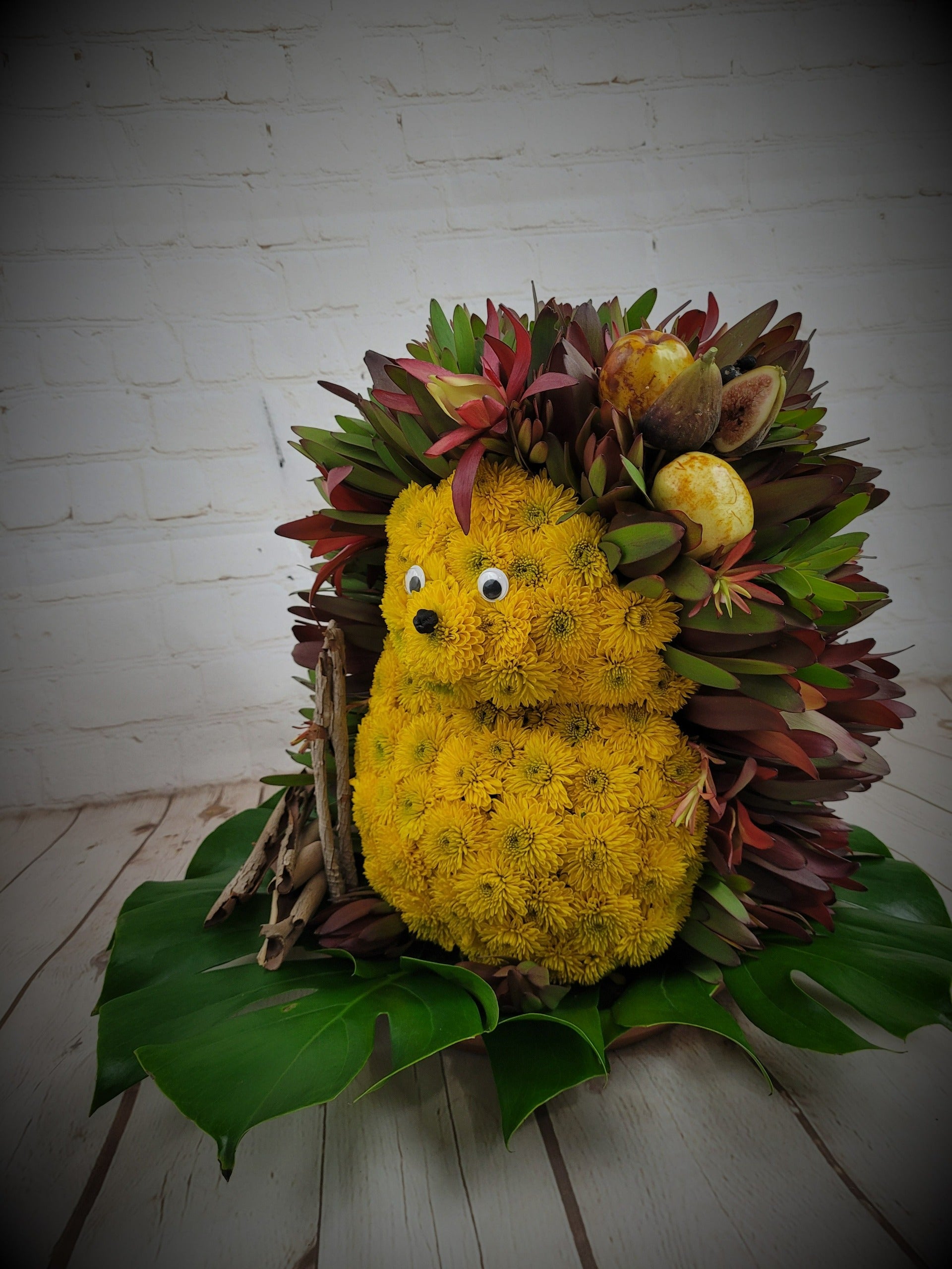 Chrysanthemums and Safari in Unique Shape Arrangement