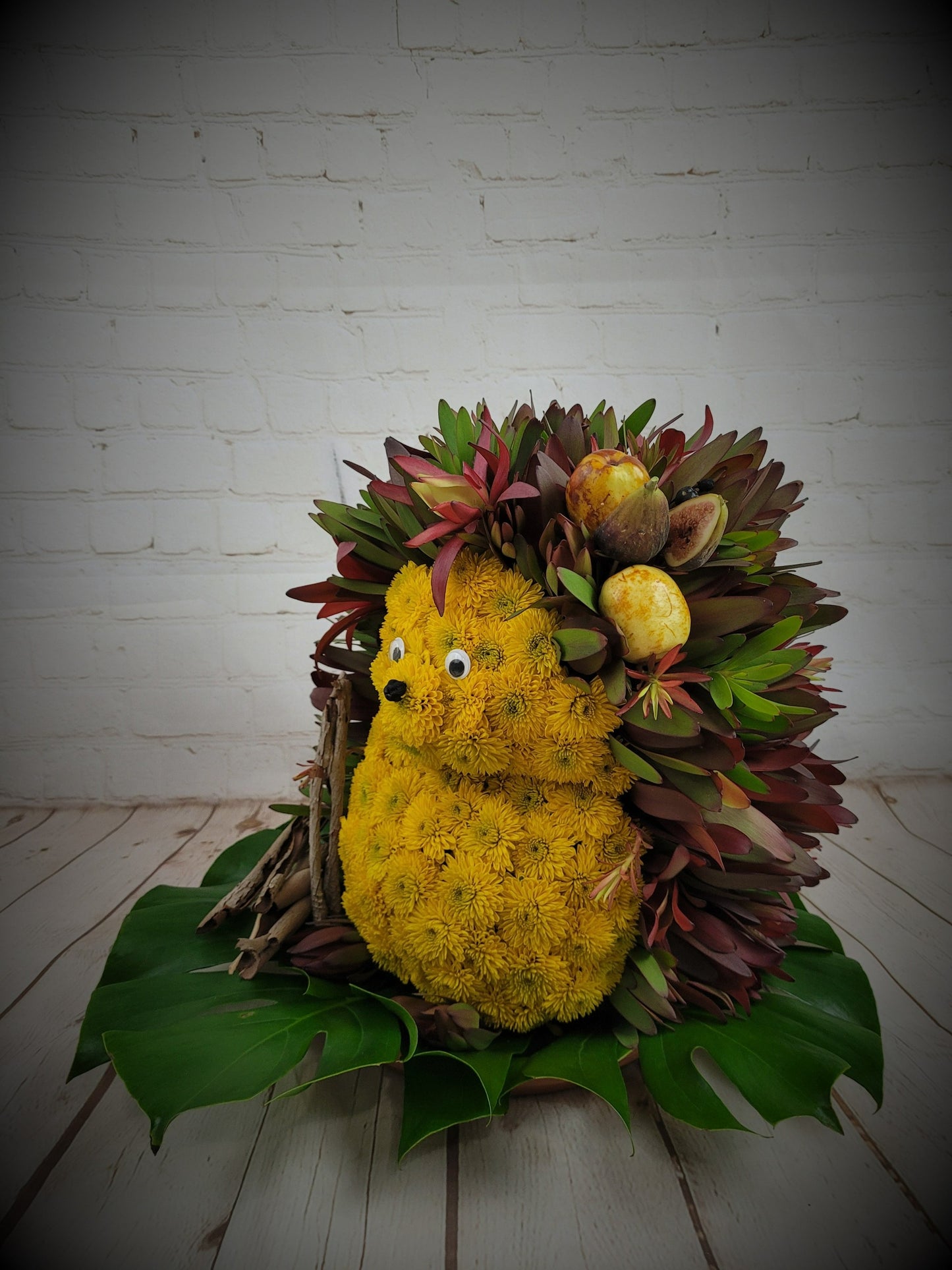Chrysanthemums and Safari in Unique Shape Arrangement