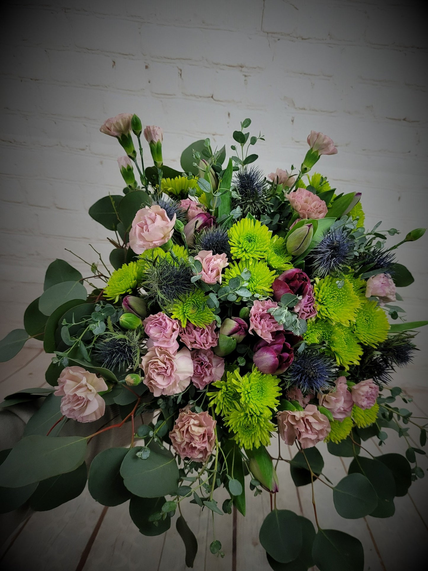 Pink, purple, blue and green seasonal bouquet