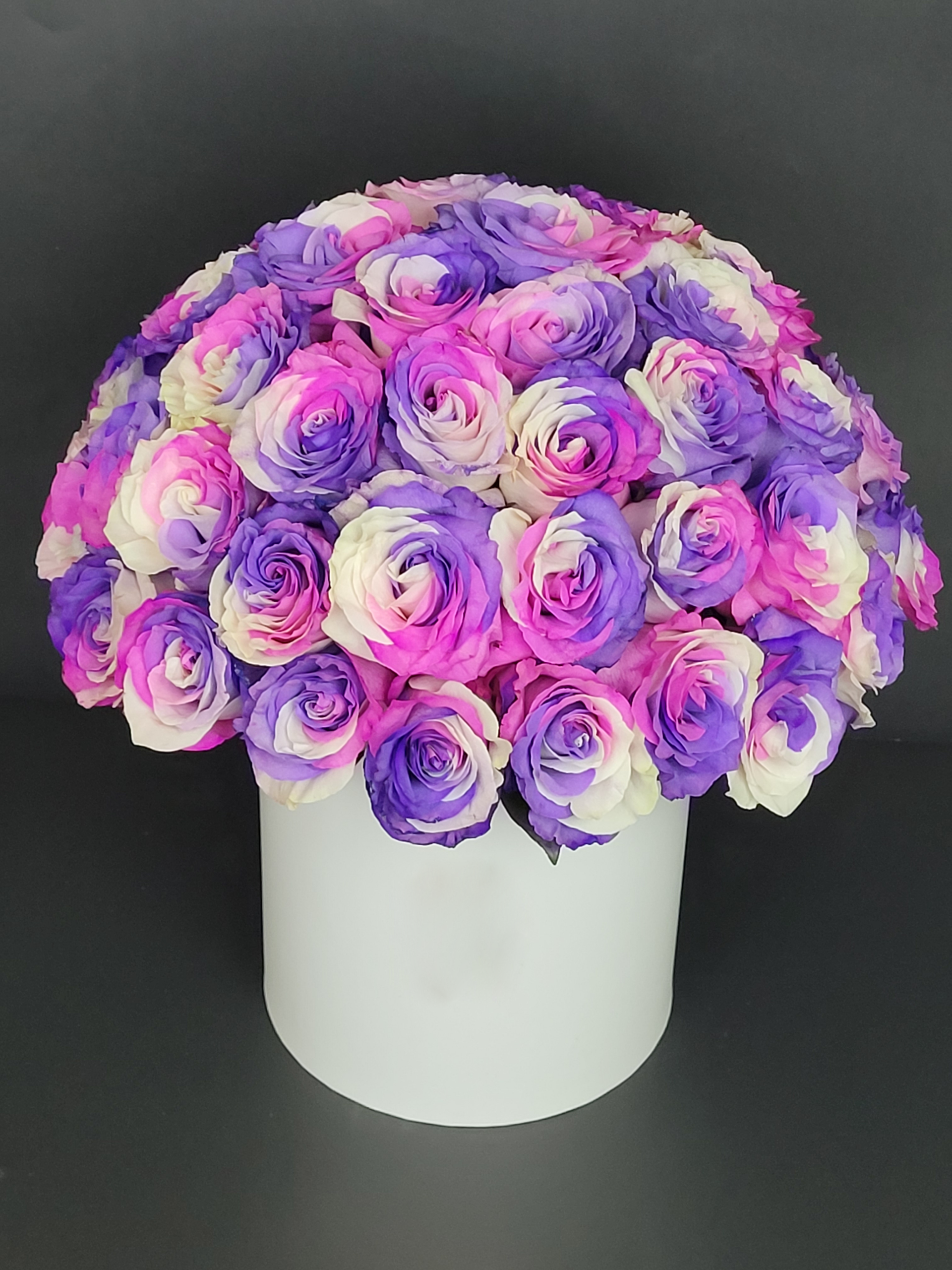 Dyed roses  in white box