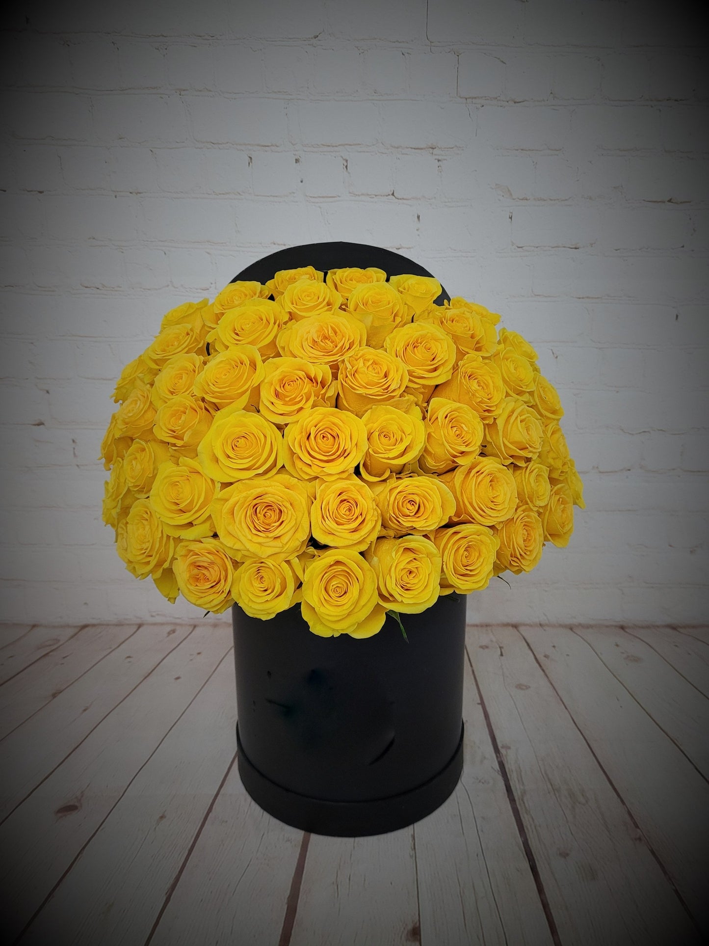 Yellow roses in a box