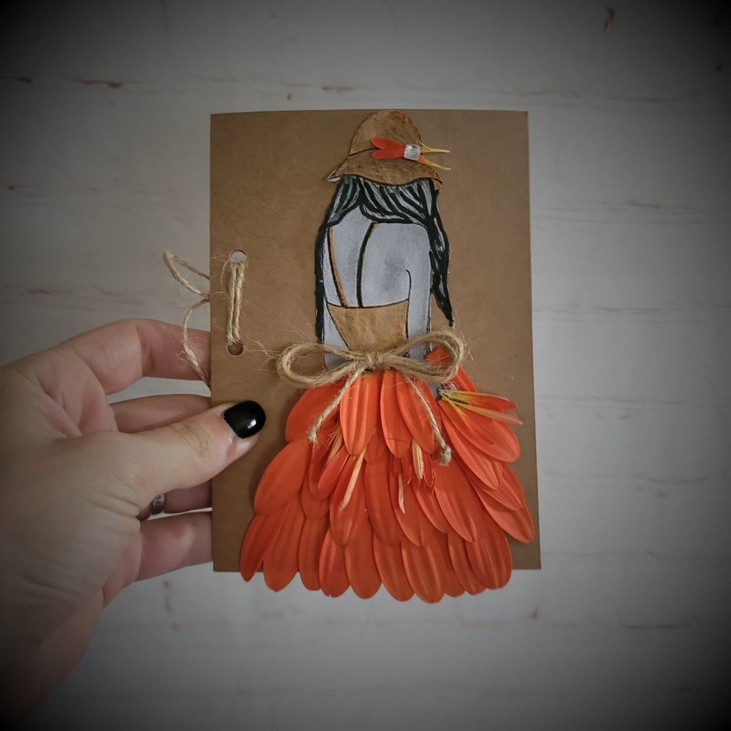 Handmade message card made with petals