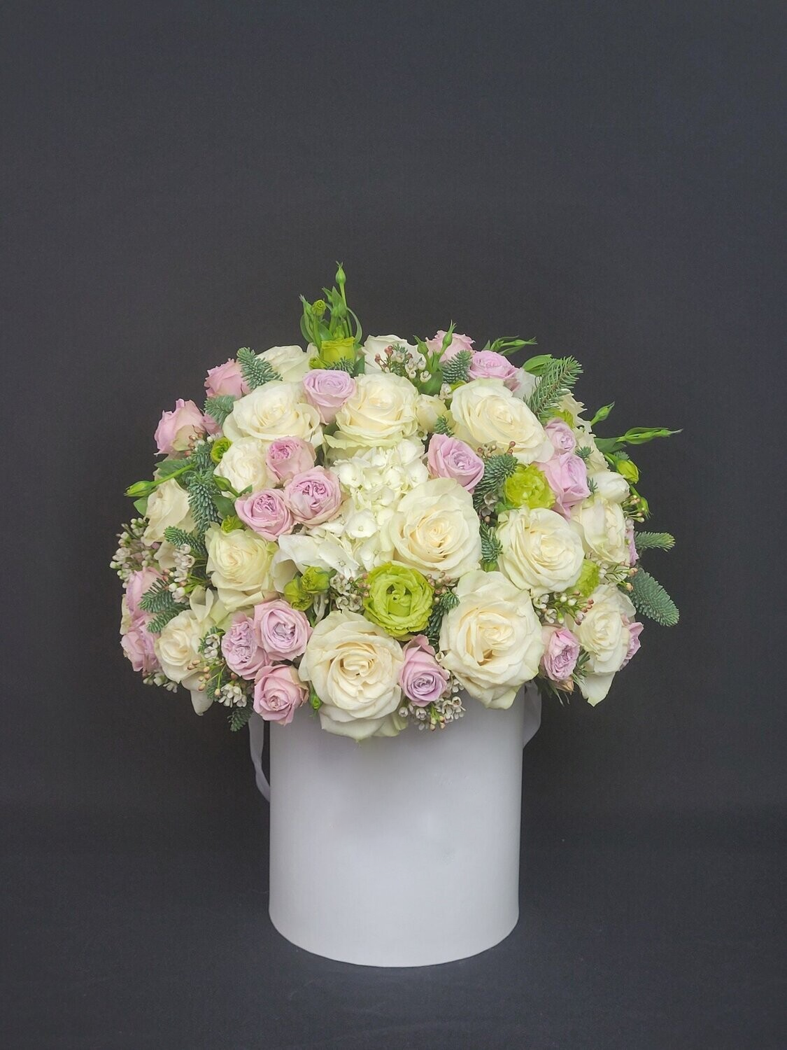 White and purple mix arrangement in white box