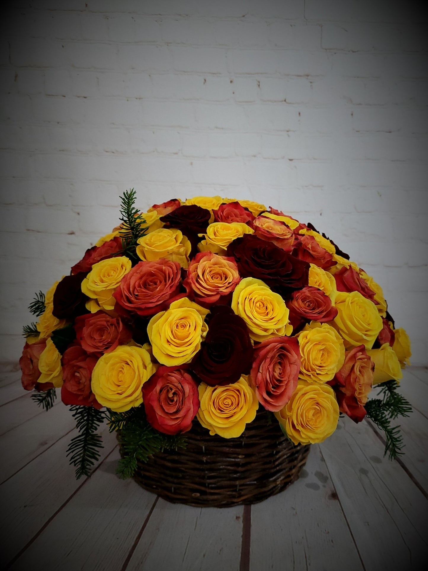 Colorful roses in basket