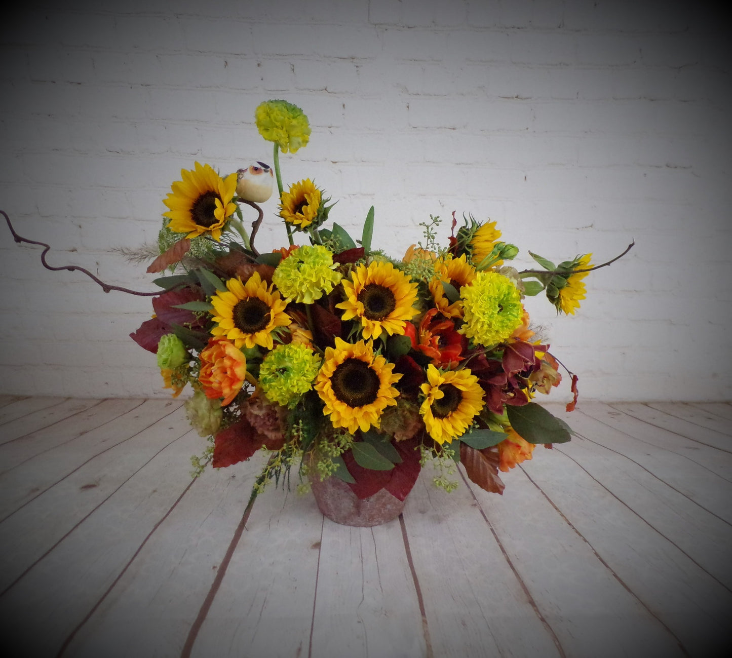 nflowers and seasonal flowers in autumn arrangement