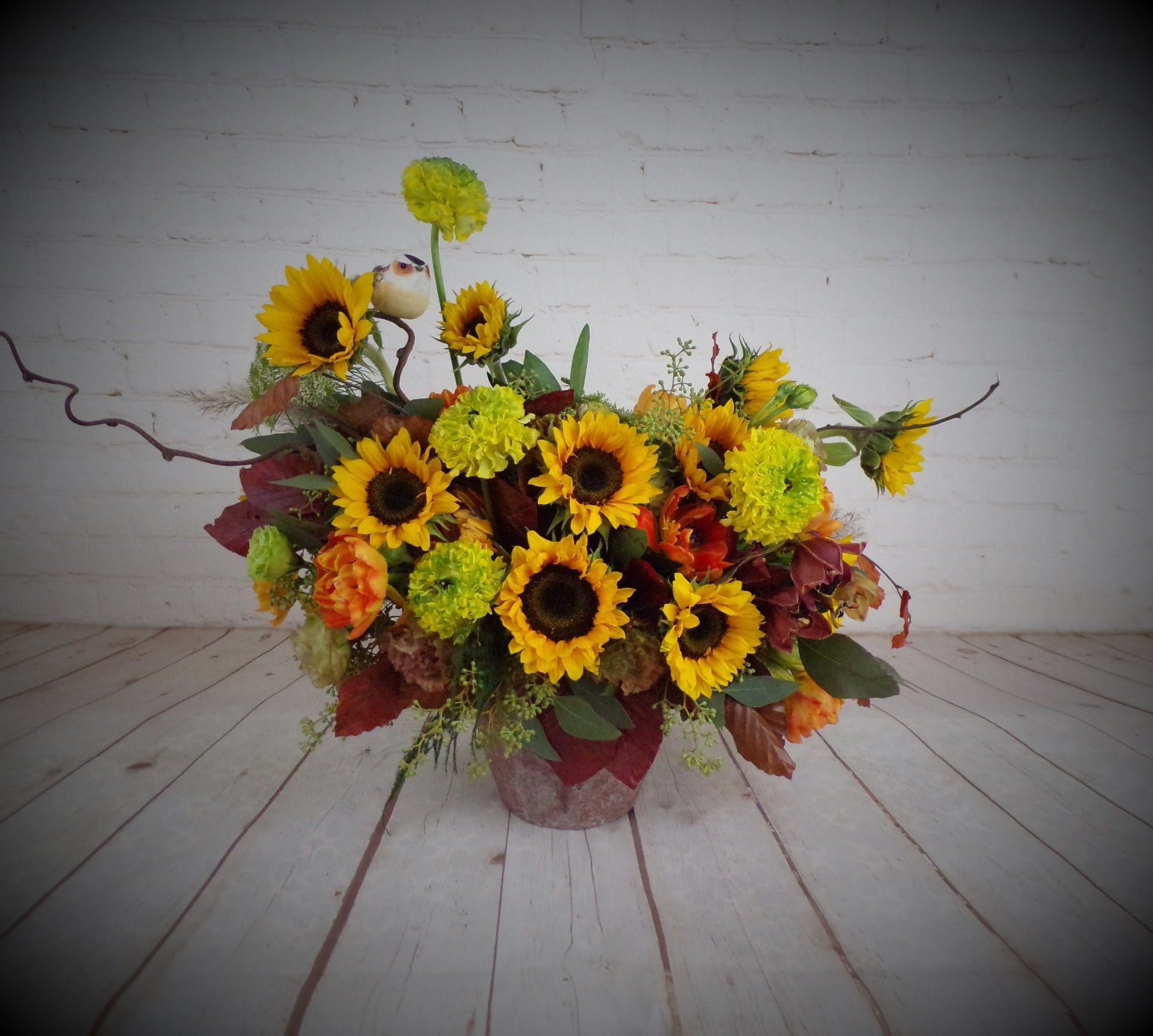 nflowers and seasonal flowers in autumn arrangement