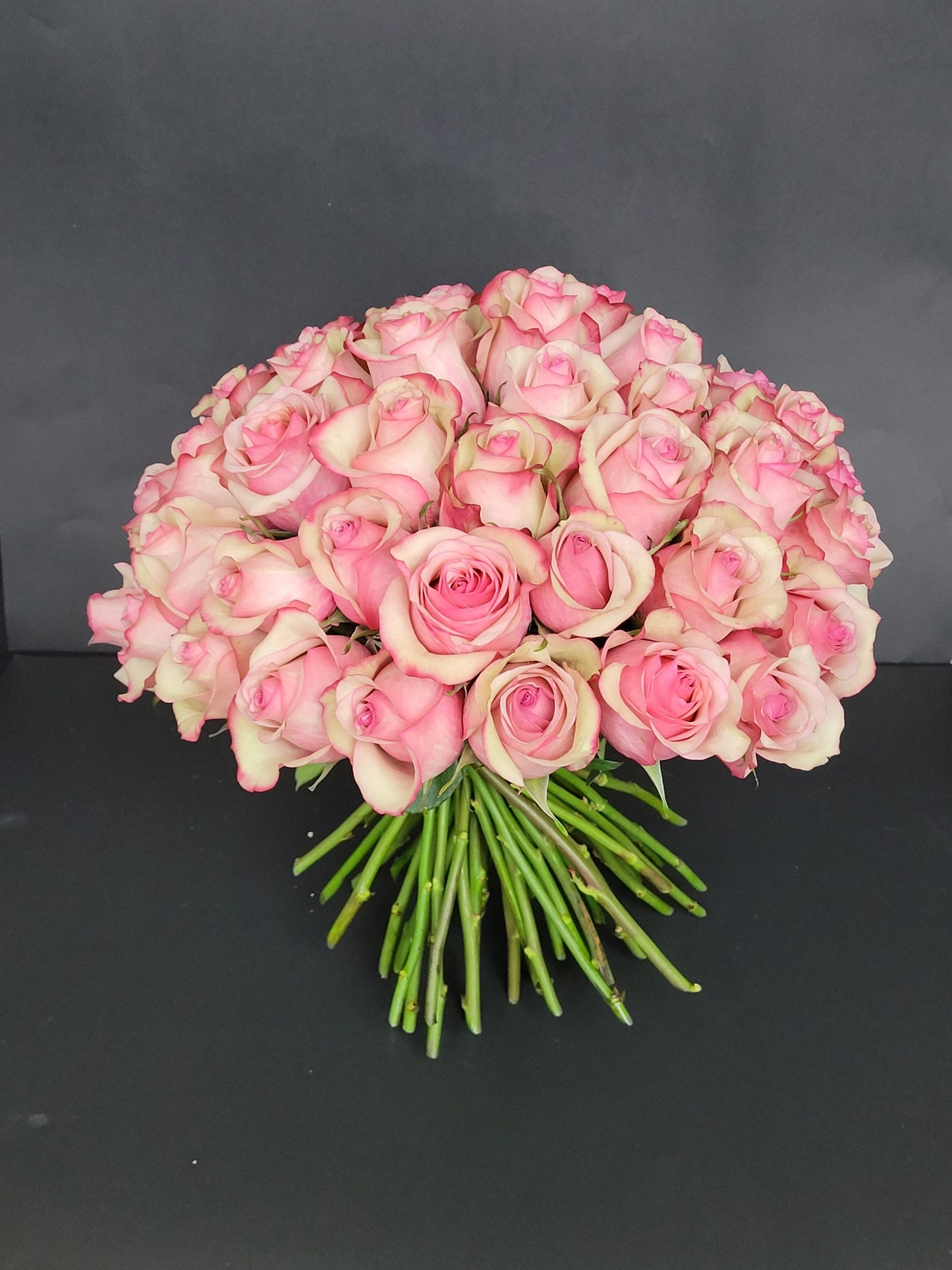 50 pink roses in a bouquet