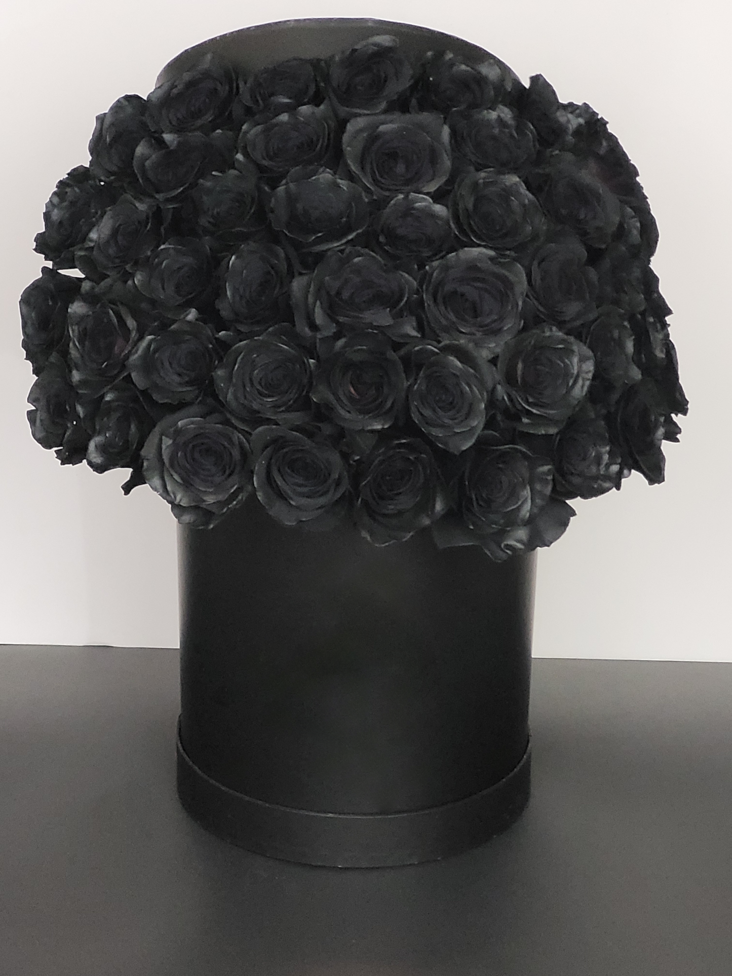 Black roses in black box