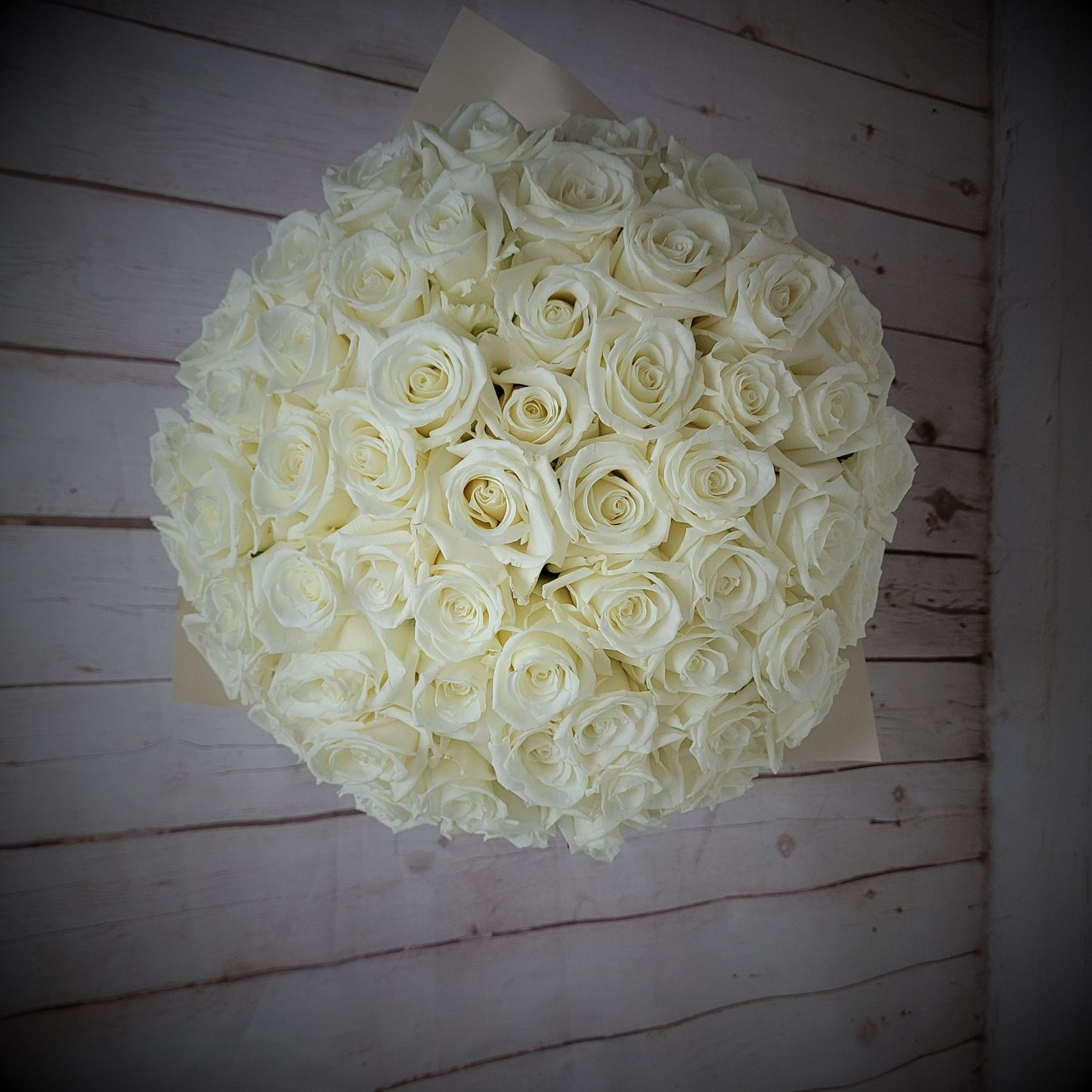 White roses in a box