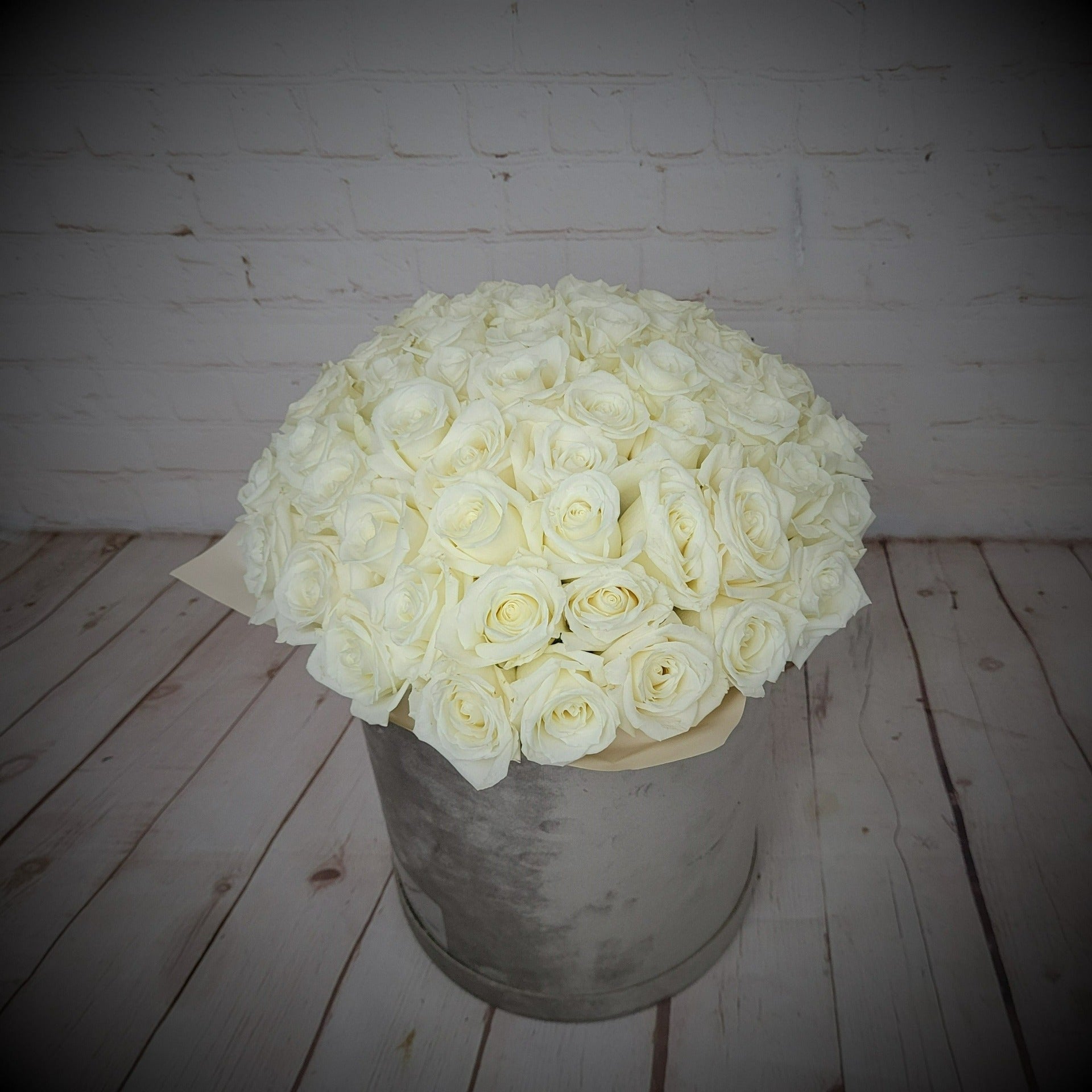 White roses in a box