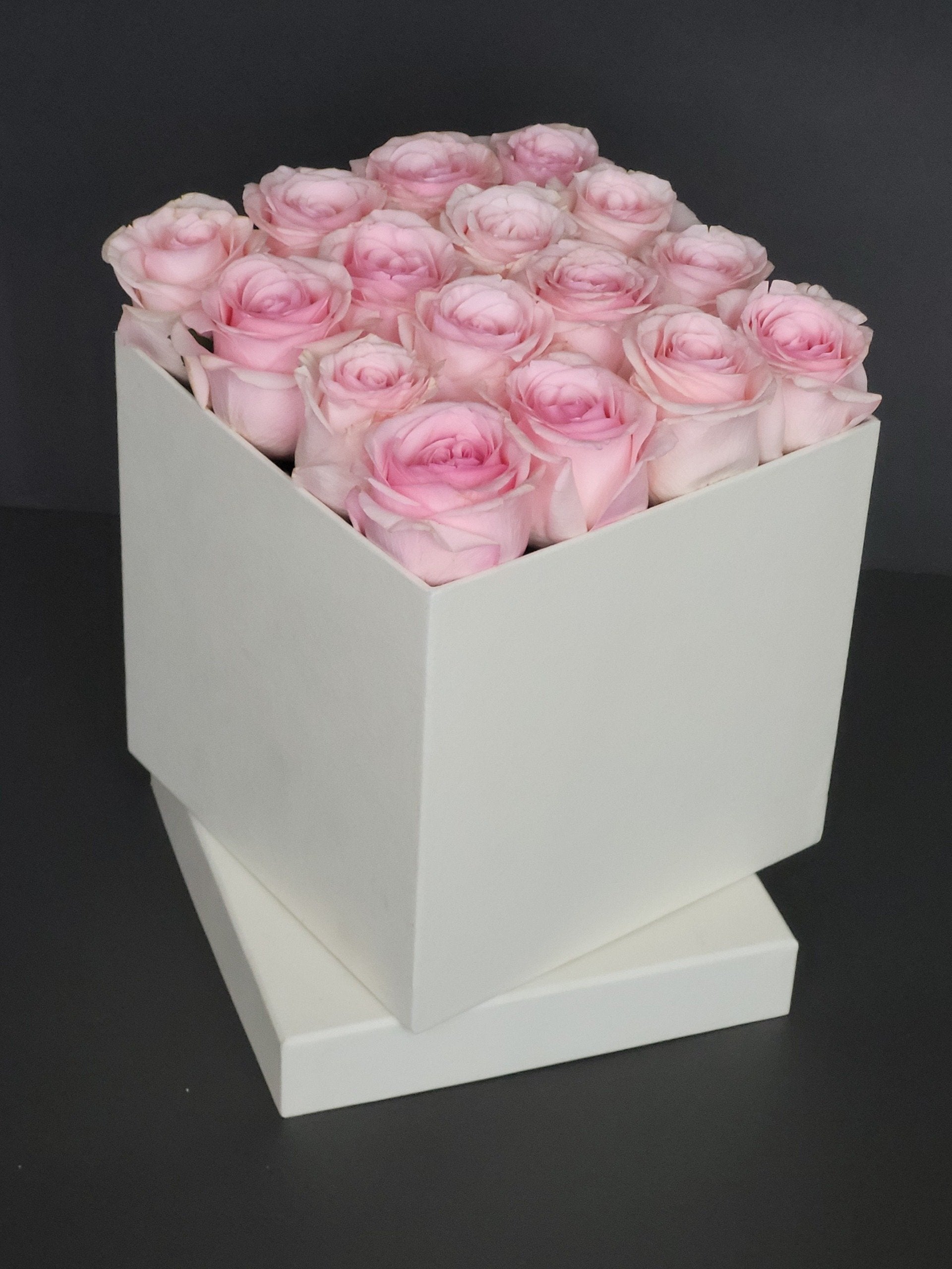 Pink roses in square box