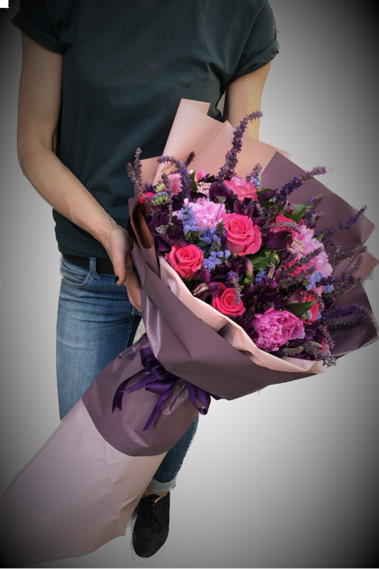 Mixed bouquet with hot pink, purple and pink flowers